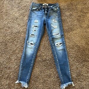 Distressed Blue Jeans